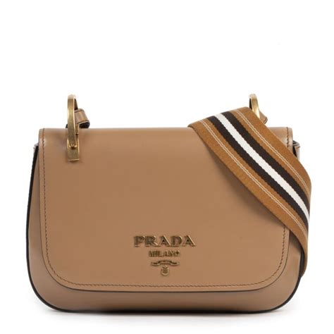 does prada sell bag straps|More.